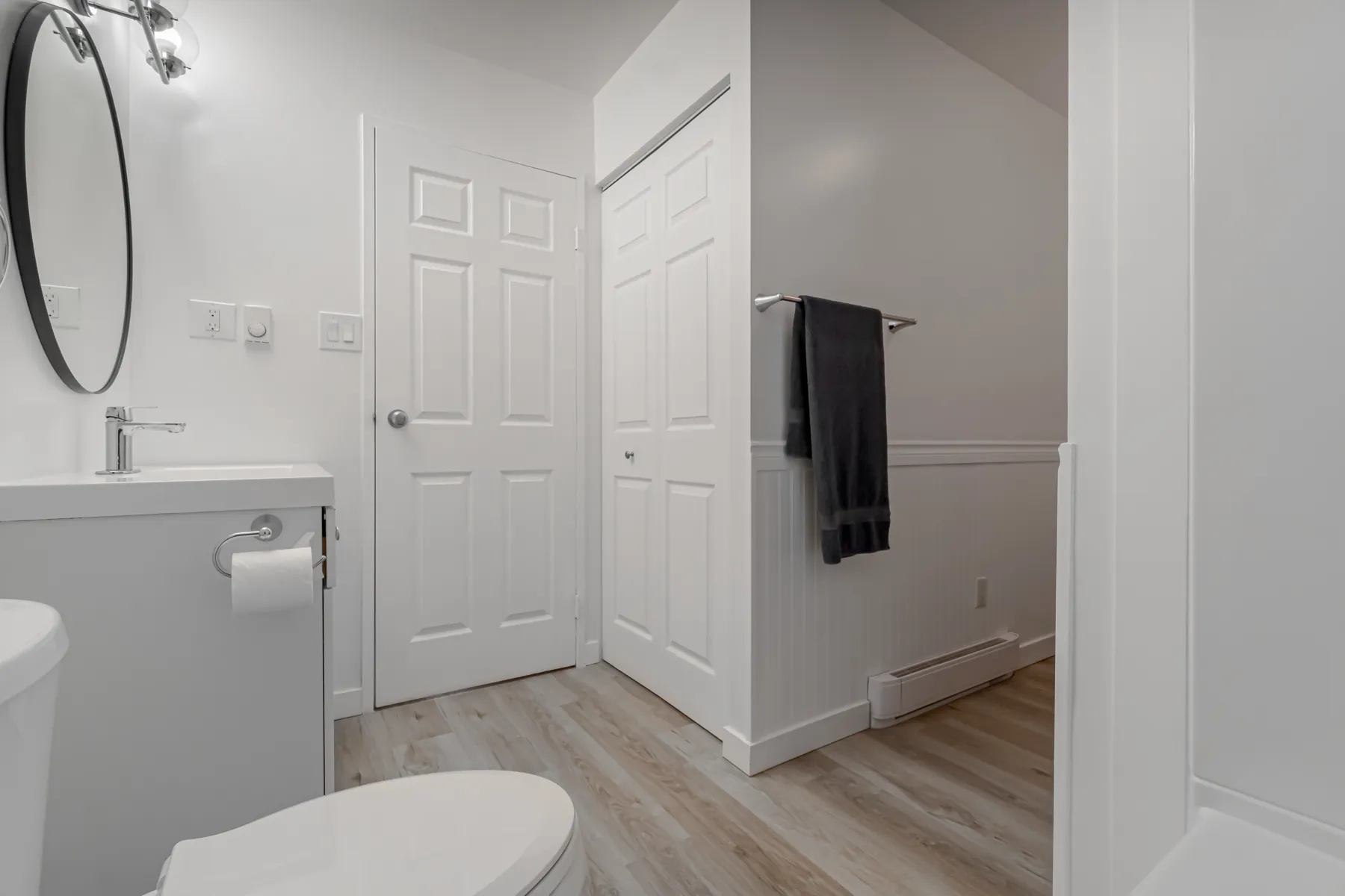 Vanity and linen doors in the refitted bathroom