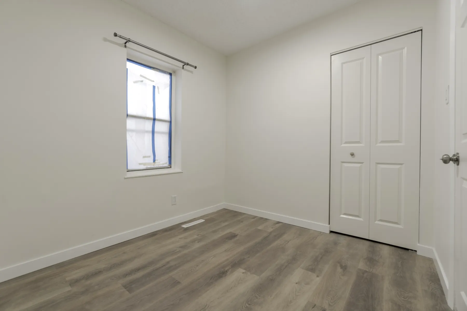 The second bedroom and its closet