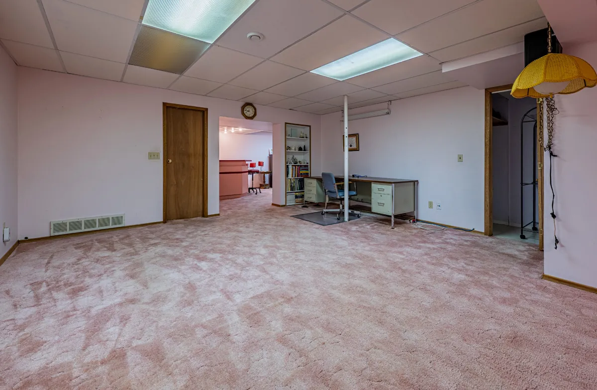 Before: the basement toward the utility area