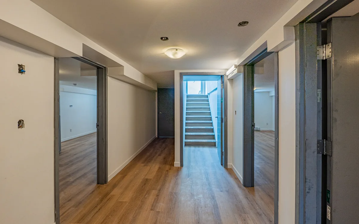 Common corridor after the renovation, new doors and flooring throughout